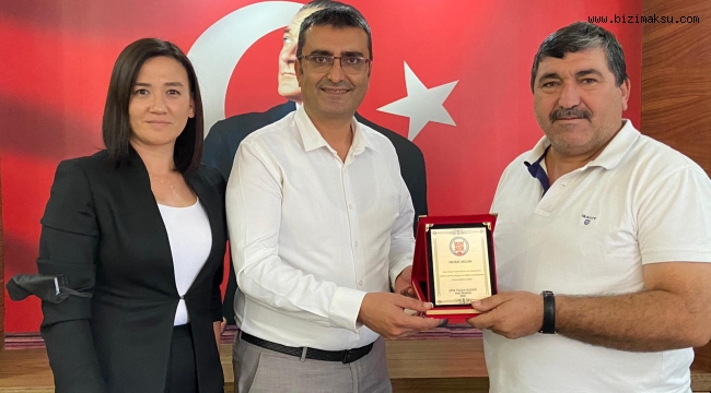 NEVZAT AKCAN’A PLAKET