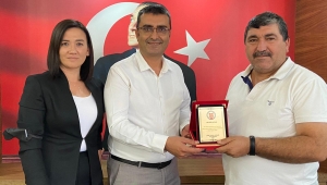 NEVZAT AKCAN’A PLAKET