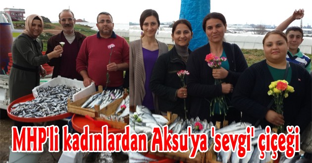 MHP'li kadınlardan Aksu'ya 'sevgi' çiçeği