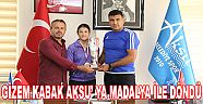 GİZEM KABAK AKSU’ YA MADALYA İLE DÖNDÜ