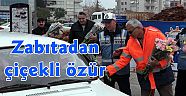 Zabıtadan çiçekli özür